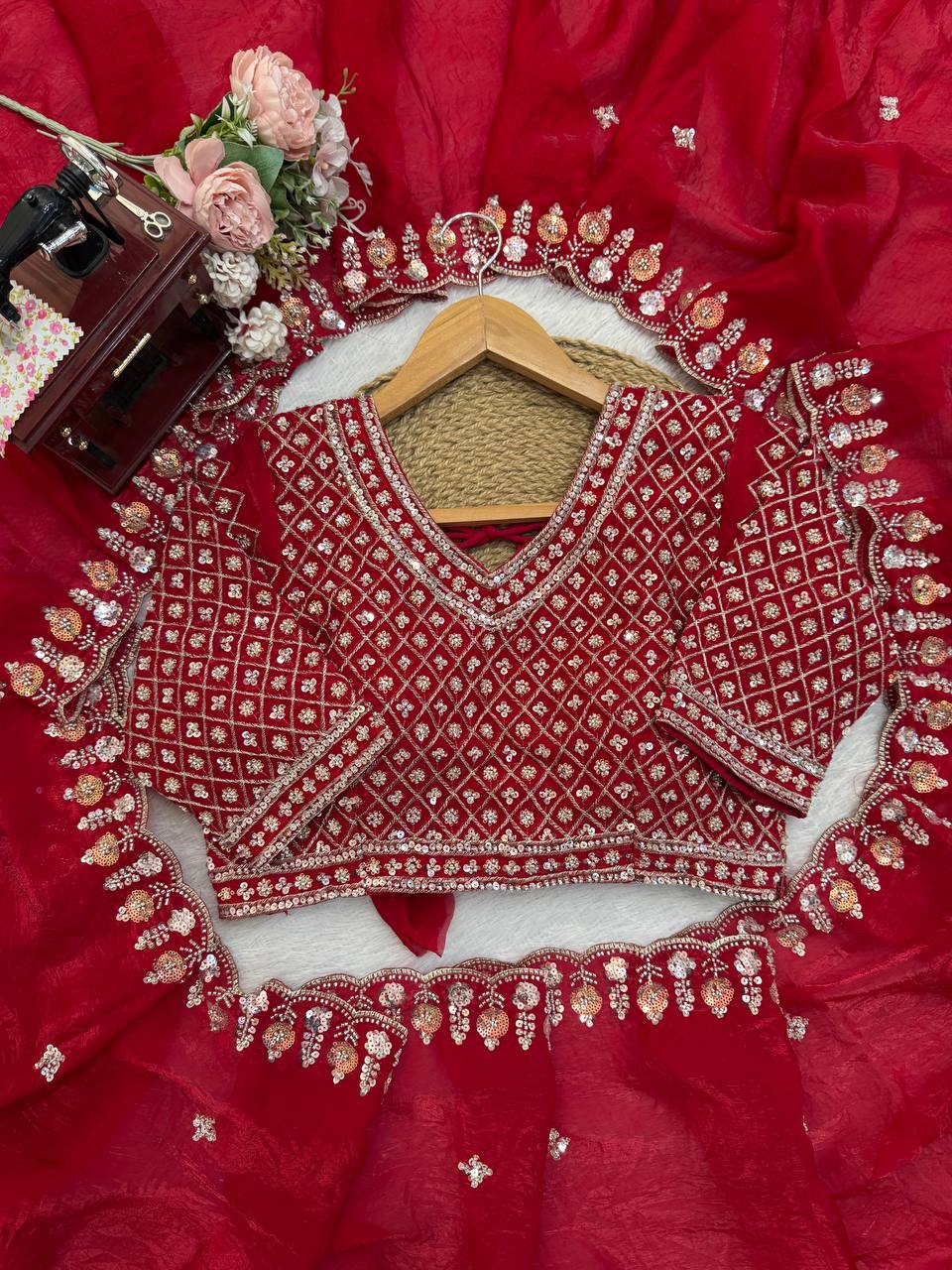 Red designer saree perfect for grand occasions