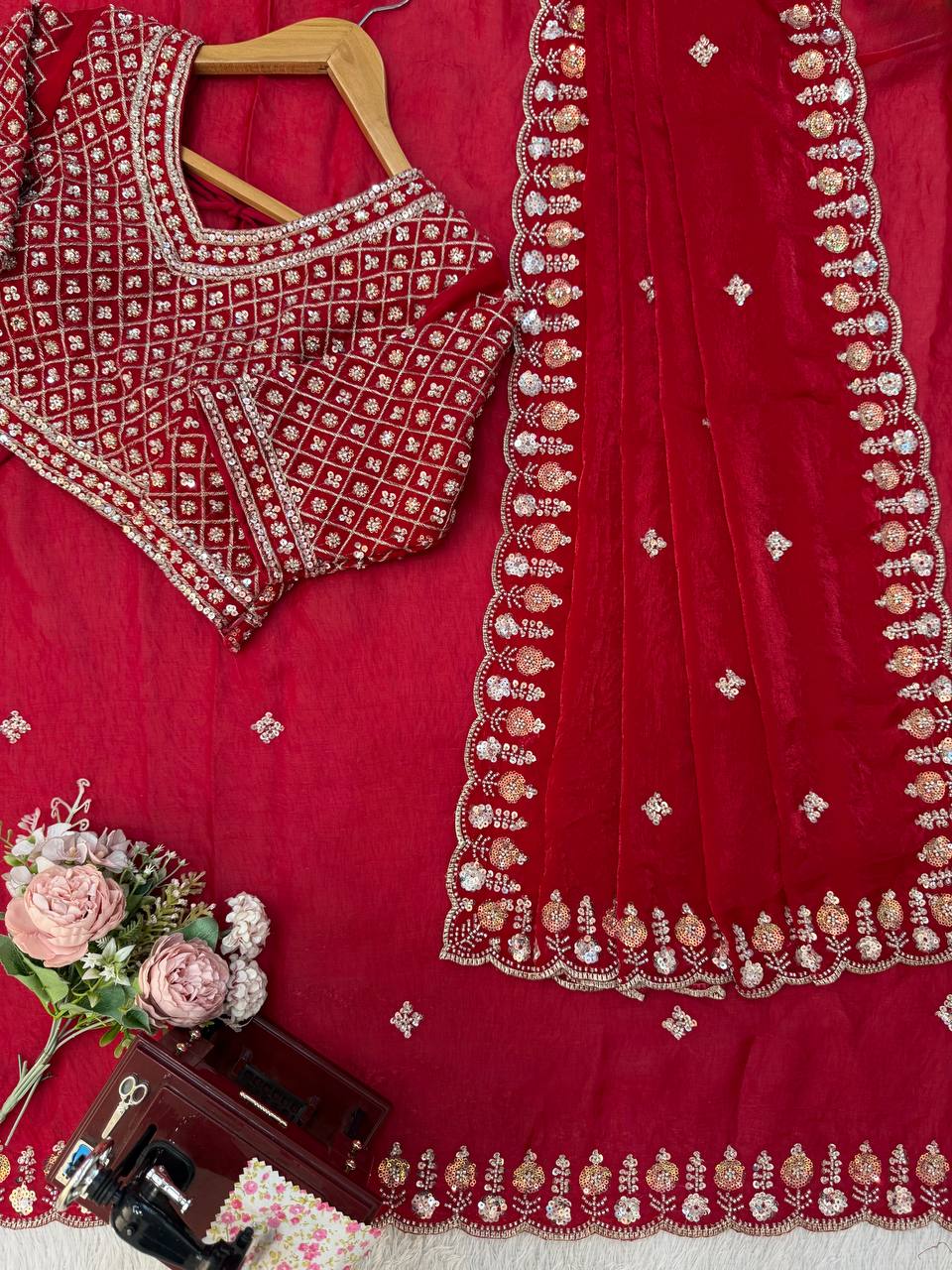 Red designer saree perfect for grand occasions
