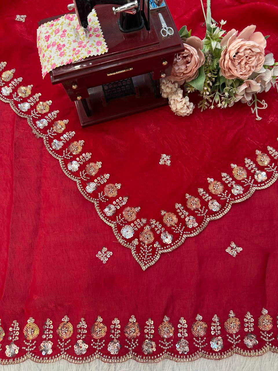Red designer saree perfect for grand occasions