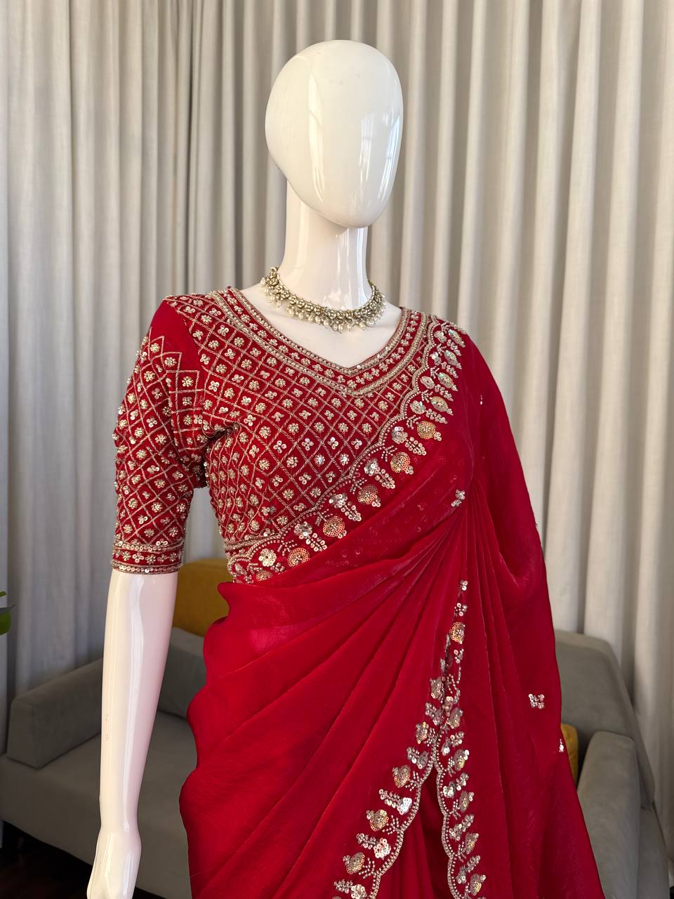 Red designer saree perfect for grand occasions
