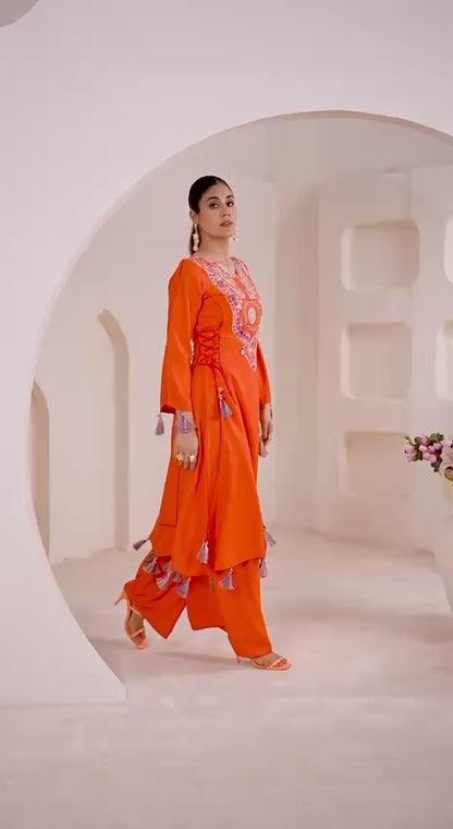 Elegant White Embroidered Kurta Palazzo Set with Tassel Details